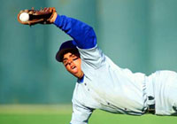 chalkboard, coloured chalk and an eraser in the background symbolizing sport education opportunities in Greater Sudbury