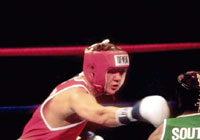 boxer going for a punch during a boxing match