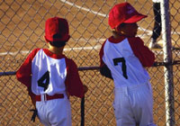 kids waiting their turn during a little league game