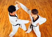 young martial arts students practicing their skills