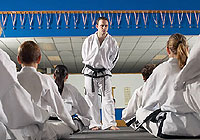 martial arts instructor speaking to his class