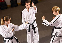 martial arts instructor overseeing his students' practice