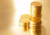 loonies are piled up high symbolizing funding opportunities for Greater Sudbury Sport Groups