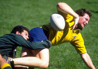 rugby players fighting for the ball during a match in progress