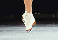 figure skater performing a jump
