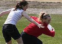 two members of Sudbury Ultimate Frisbee Club during a game