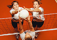 an attack block during a volleyball game