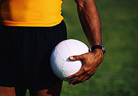 volleyball player holding a volleyball